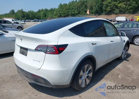 2023 Tesla Model Y Awd/Long Range Dual Motor All-Wheel Drive z USA, uszkodzony, nr VIN 7SAYGDEE5PA126165